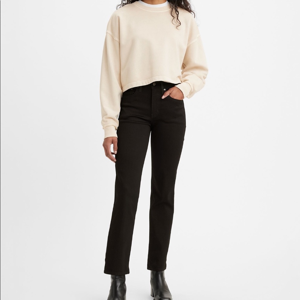 724 high rise slim straight black jeans. Levi’s. NWT.